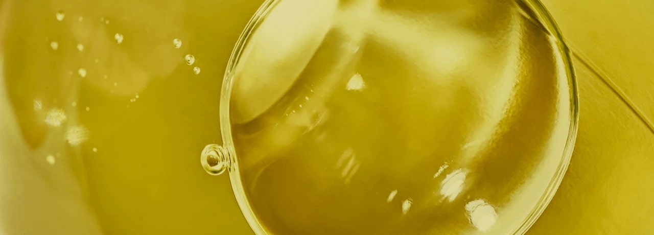Close up image of drop of Fur oil